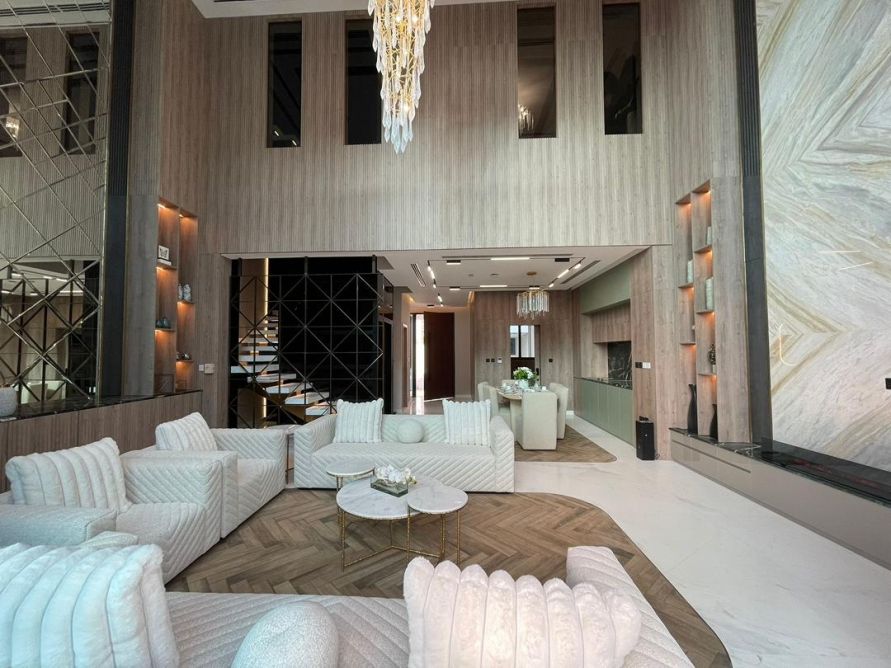 Formal living room with textured stone feature wall